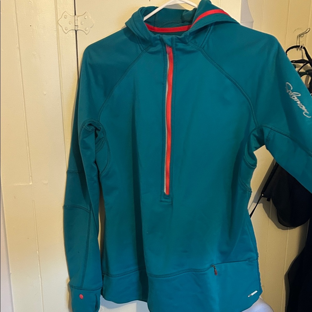 Turquoise Salomon women's sportswear